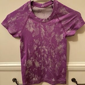 Lululemon swiftly tech shirt short sleeve purple size 0 hemmed slightly